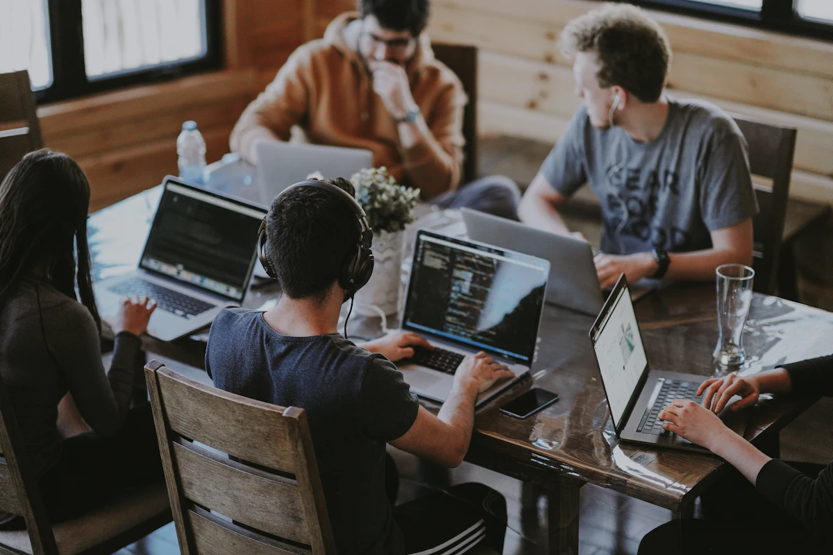 A team delivering work together in a modern office